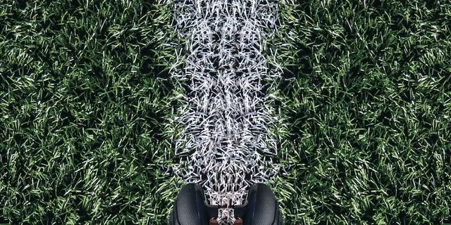Can you wear soccer cleats for American football?